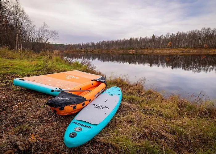 Шале Ivalo Northern Lights Riverfront Lapland Sauna Hot Tub Near Airport Инари